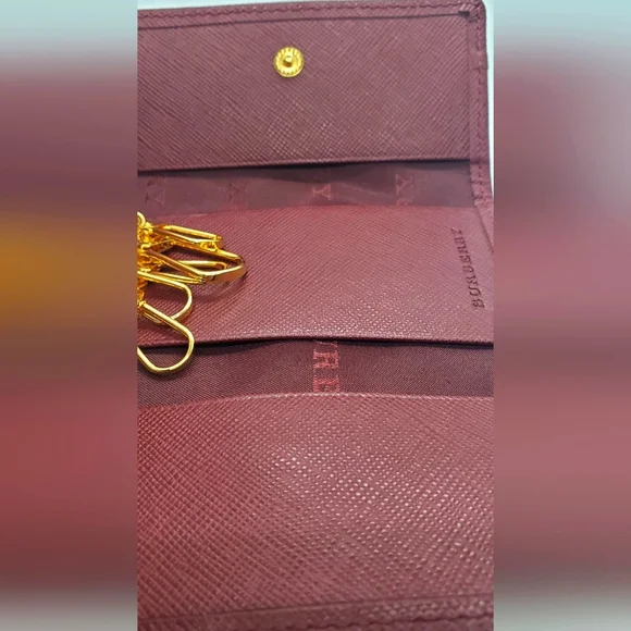 BURBERRY- Burgundy Key Holder with Gold Accents -Like-New -